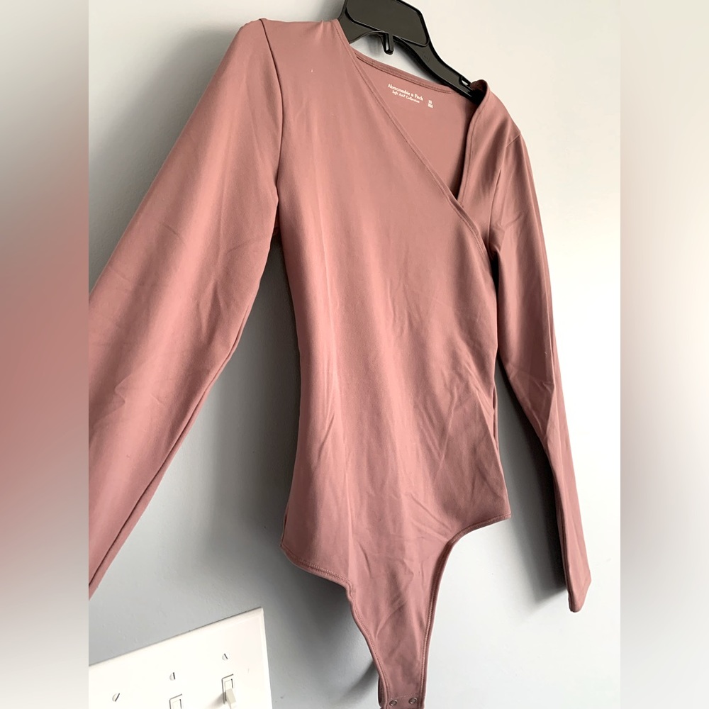 Abercrombie and Fitch A&F Seamless Asymmetrical Bodysuit in Mauve